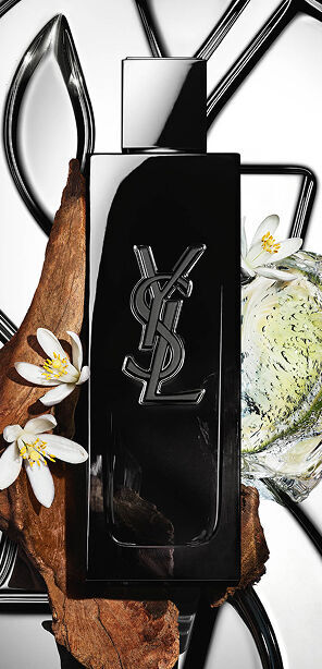 MYSLF Eau de Parfum bottle by YSL Beauty surrounded by fresh bergamot, orange blossom and woods.