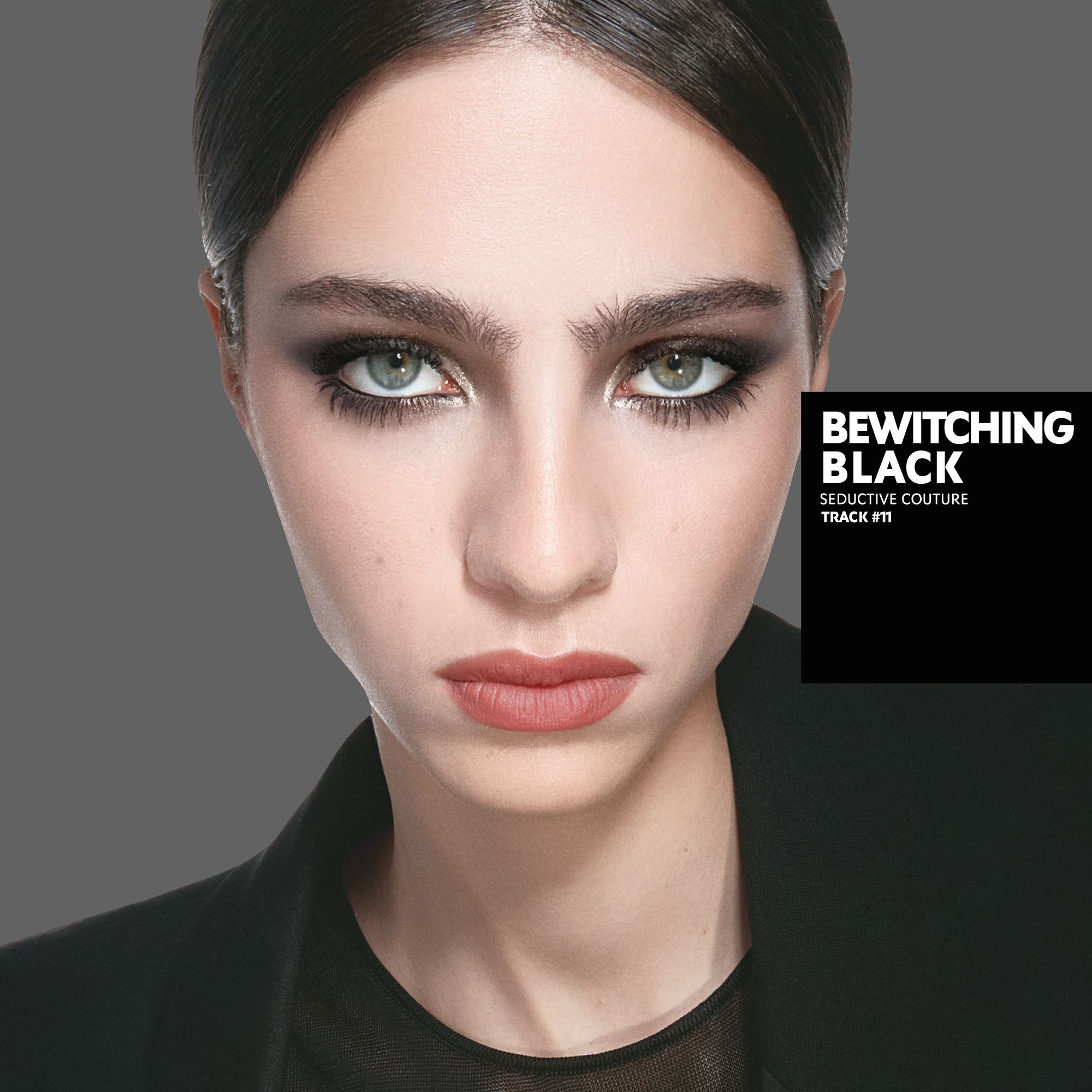 Loli, light skin tone, with a seductive couture bewitching black eye look and nude lips.