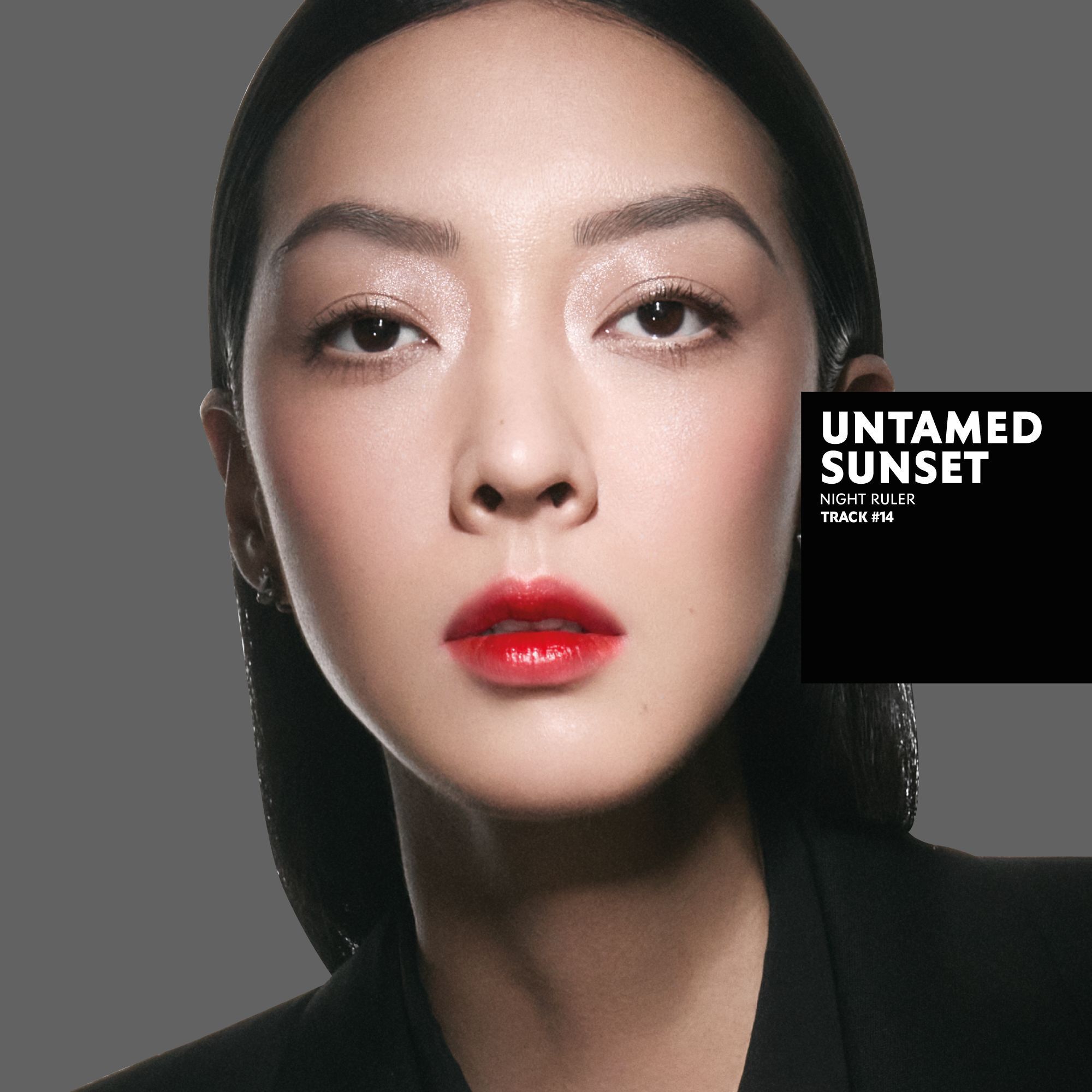 So-Young, fair skin tone, with an untamed sunset eye look featuring subtle shimmer, and a red ombre lip.