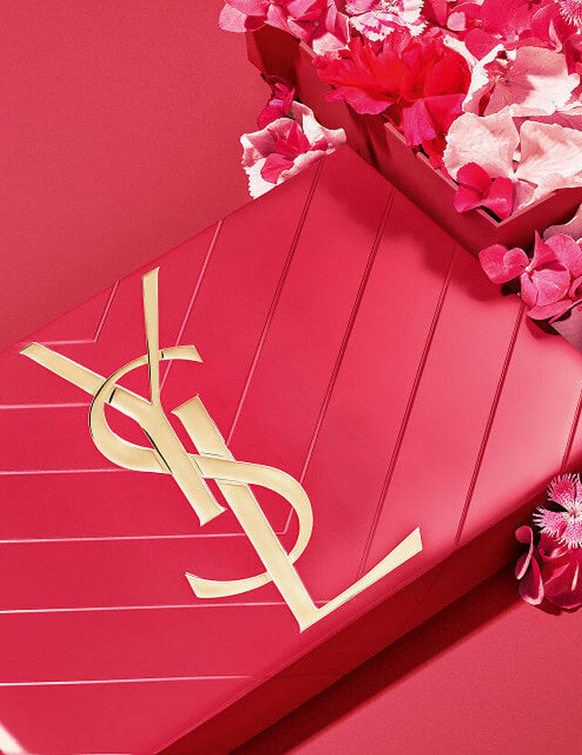 YSL Mother's day pink gift set, featuring the iconic Cassandre logo, overflowing with delicate pink floral accents.