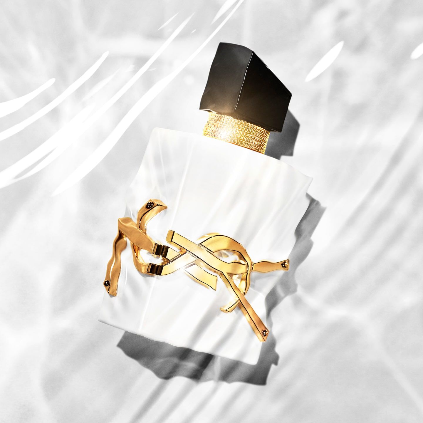 A Radiant White Couture Fragrance Bottle
