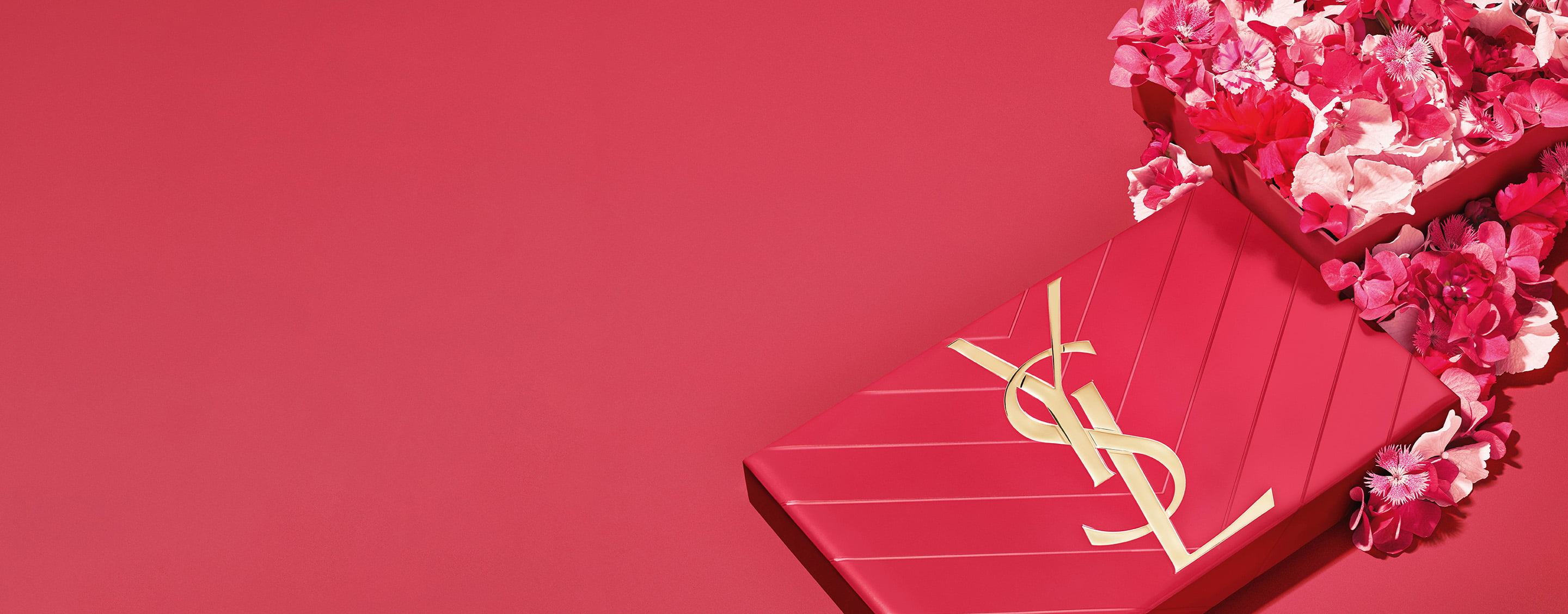 YSL Mother's day pink gift set, featuring the iconic Cassandre logo, overflowing with delicate pink floral accents.