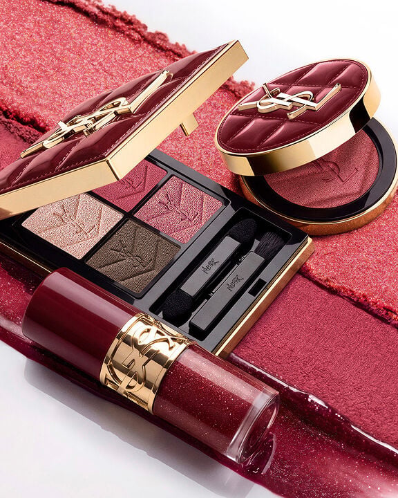 YSL Holiday makeup duo on burgundy texture strokes with palette and gloss