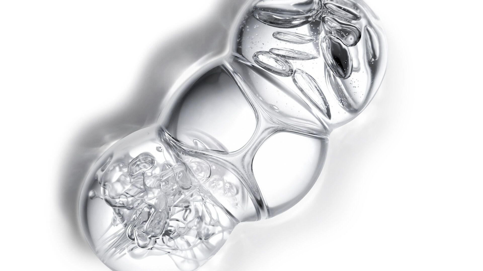 YSL Beauty Pure Shots Youth Reload complex, depicted as three interconnected, clear spheres.