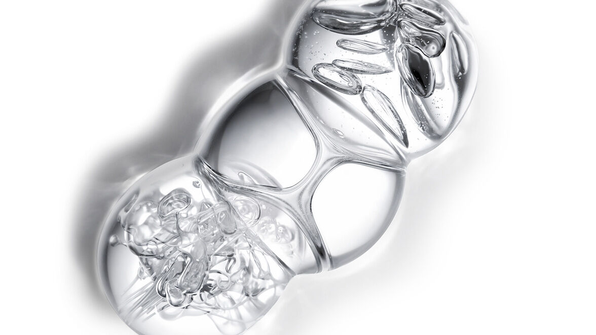 YSL Beauty Pure Shots Youth Reload complex, depicted as three interconnected, clear spheres.