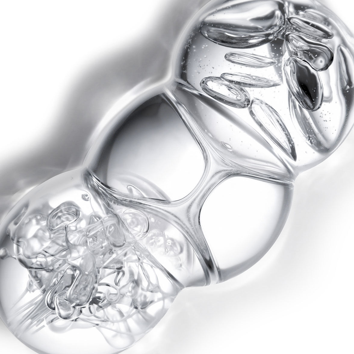 YSL Beauty Pure Shots Youth Reload complex, depicted as three interconnected, clear spheres.