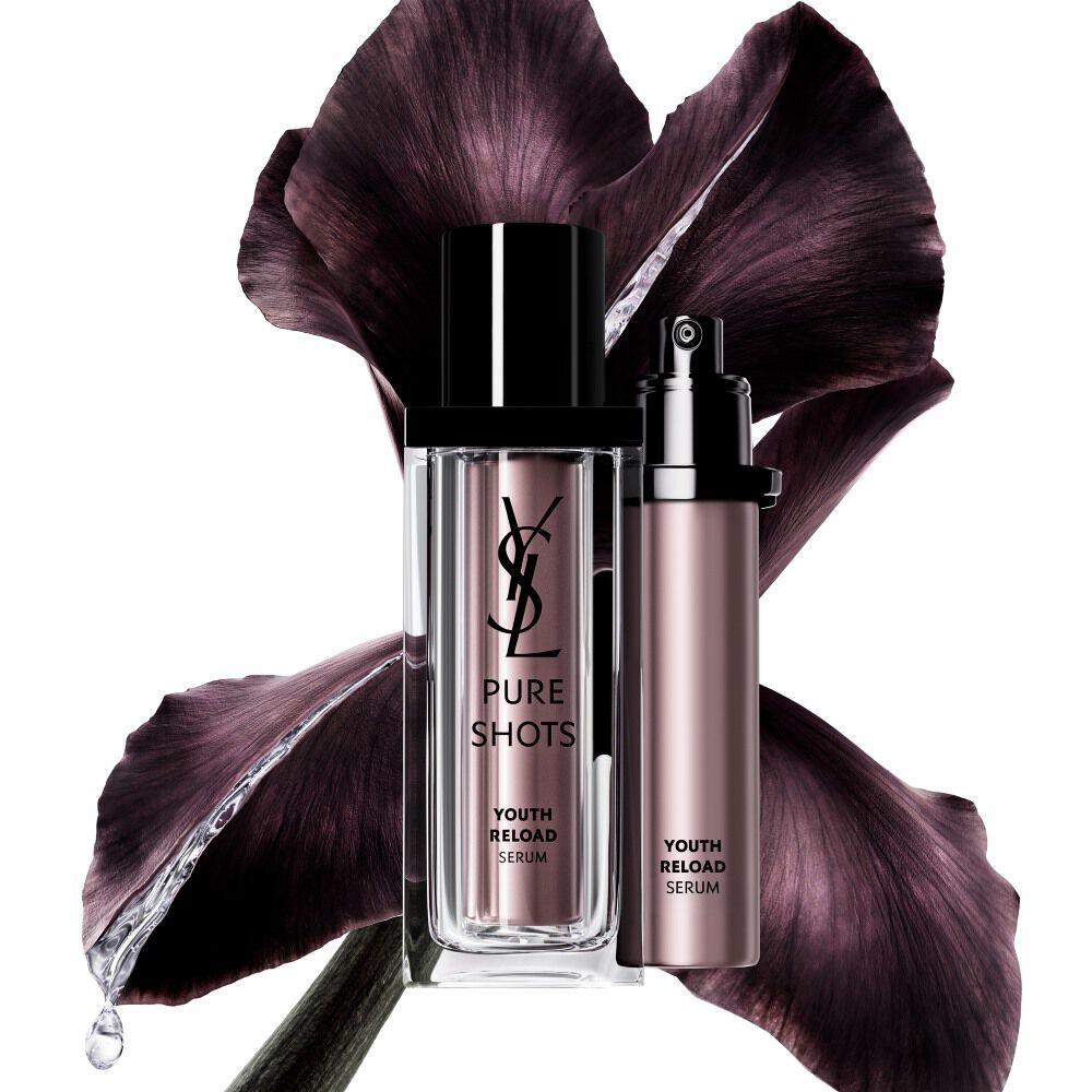 YSL Beauty Pure Shots Youth Reload Serum and its sustainable refill, set against a dark purple iris flower.
